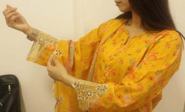 close-up shot of yellow sada bahar embroidered dress