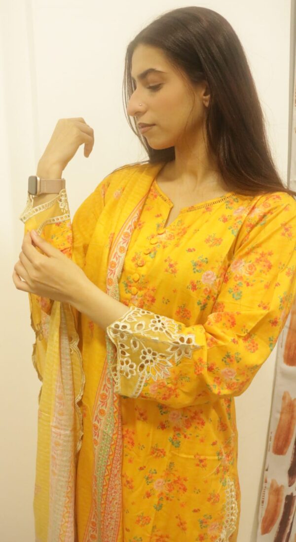 close up shot of sada bahar yellow embroidered 3 pc suit